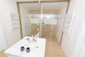 Kúpeľňa v ubytovaní Apartament Kołobrzeg Quattro + 5 fotografií