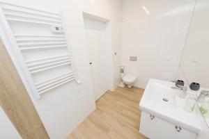 Kúpeľňa v ubytovaní Apartament Kołobrzeg Quattro