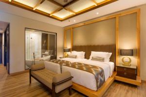 Vuode tai vuoteita majoituspaikassa The Gantari Ubud Hotel & Villa