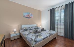 Posteľ alebo postele v izbe v ubytovaní Holiday House Vita