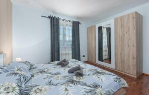 Posteľ alebo postele v izbe v ubytovaní Holiday House Vita