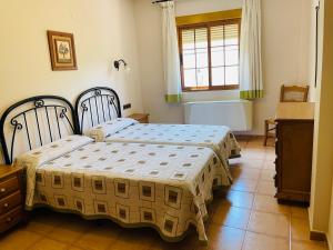 Ένα ή περισσότερα κρεβάτια σε δωμάτιο στο Apartamentos Margarita +18 φωτογραφίες