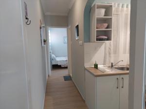 Posteľ alebo postele v izbe v ubytovaní Vasileiadou Coastal Rooms