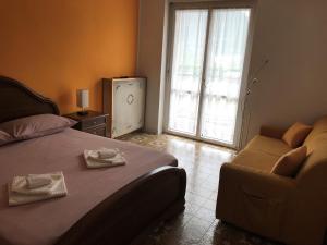 Posteľ alebo postele v izbe v ubytovaní B&B La Terrazza