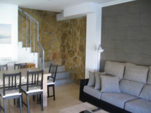Posezení v ubytování Duplex junto a un Parque