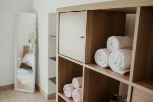 Postel nebo postele na pokoji v ubytování Les 4 Arbres