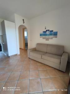 A seating area at bilocale Murta Maria vacanze