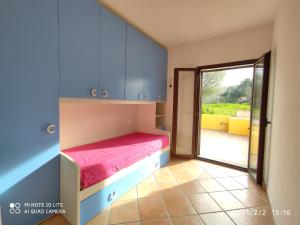 A bed or beds in a room at bilocale Murta Maria vacanze