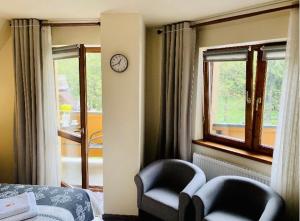 Posteľ alebo postele v izbe v ubytovaní Apartamenty u Magika