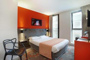 TV a/nebo společenská místnost v ubytování Hotel Eiffel Capitol + 23 fotografií