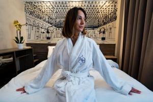 Postel nebo postele na pokoji v ubytování Hotel Plaza