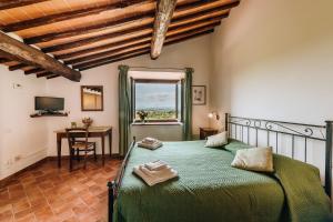 Posteľ alebo postele v izbe v ubytovaní Villa Di Sotto