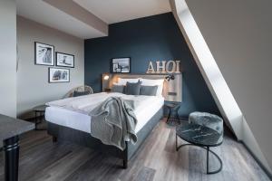 Ліжко або ліжка в номері HARBR. Hotel Ludwigsburg