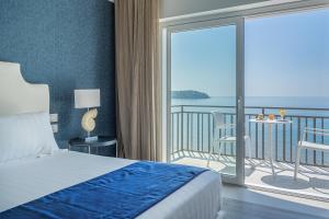 Postel nebo postele na pokoji v ubytování Summit Hotel + 37 fotografií