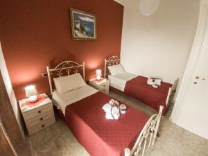 Postel nebo postele na pokoji v ubytování B&B Rosy Gallo