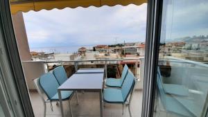 A balcony or terrace at Apartments M, Kallikratia