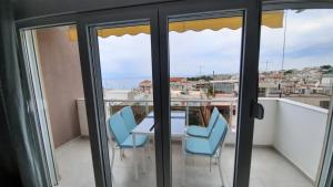 A balcony or terrace at Apartments M, Kallikratia