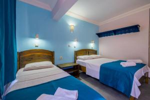 Cama o camas de una habitación en Selim Pansiyon