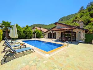 Swimmingpoolen hos eller tæt på Villa Kayakoy 1 - Private Stone Villa