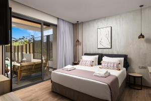 Säng eller sängar i ett rum på YasMyr Villas