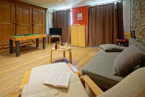 Istumisnurk majutusasutuses Le Clos Arboré (Gîte)