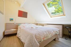 Voodi või voodid majutusasutuse Le Clos Arboré (Gîte) toas