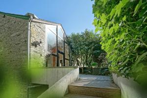Aed väljaspool majutusasutust Le Clos Arboré (Gîte)
