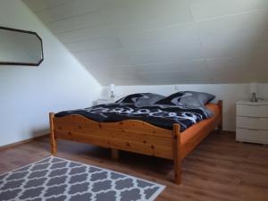Llit o llits en una habitació de Ferienhaus Domus