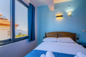 Cama o camas de una habitación en Selim Pansiyon