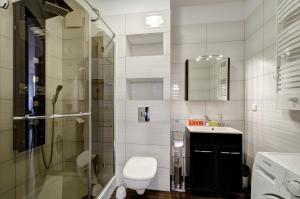 Vonios kambarys apgyvendinimo įstaigoje Dom & House - Apartamenty Aquarius