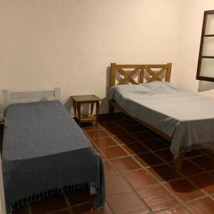 Krevet ili kreveti u jedinici u objektu Chalés Bambá