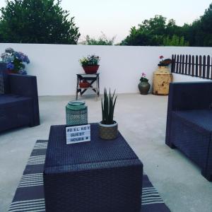 Uma área de estar em DEl Rey Guest House