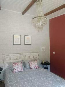 Cama ou camas em um quarto em DEl Rey Guest House