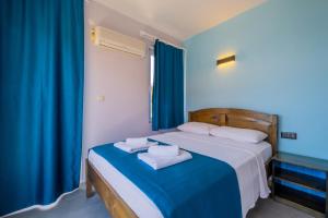 Cama o camas de una habitación en Selim Pansiyon