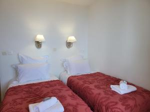 Ένα ή περισσότερα κρεβάτια σε δωμάτιο στο T2 + CABINE VILLA FRANCIA +9 φωτογραφίες