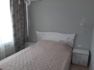 Posteľ alebo postele v izbe v ubytovaní Квартира у моря Аркадия в 48 жемчужине