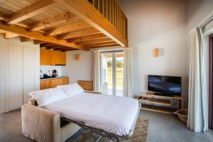 Postel nebo postele na pokoji v ubytování Monte da Bemposta