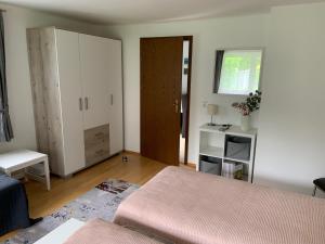 Łóżko lub łóżka w pokoju w obiekcie InNatura Velden