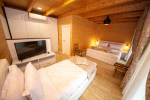 Ένα ή περισσότερα κρεβάτια σε δωμάτιο στο Sebastiano Resort