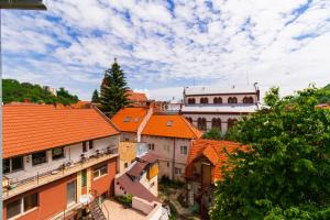 an overhead view of a city with orange roofs at DB Apt - Comfort and Space in the heart of Old Town in Braşov