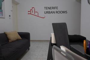 A seating area at TENERIFE URBAN ROOMS