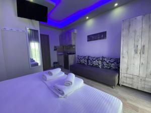 Postel nebo postele na pokoji v ubytování Nikolaidis Apartments