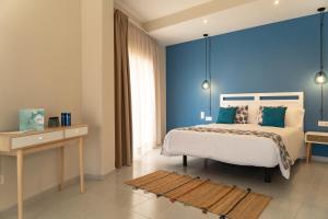 Postel nebo postele na pokoji v ubytování Hotel Aubí