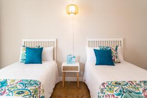 Postel nebo postele na pokoji v ubytování Hotel Aubí