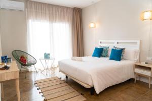 Postel nebo postele na pokoji v ubytování Hotel Aubí