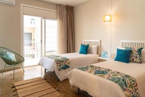 Postel nebo postele na pokoji v ubytování Hotel Aubí