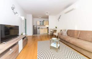 Iris apartment private parking tesisinde bir televizyon ve/veya eğlence merkezi