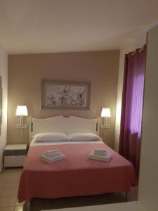 Ένα ή περισσότερα κρεβάτια σε δωμάτιο στο Tenuta Di Pontesodo