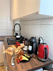 Príslušenstvo na prípravu kávy alebo čaju v ubytovaní Apartament Centrum Chmielna 73c