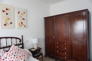 Łóżko lub łóżka w pokoju w obiekcie CASA DA MADRIÑA
